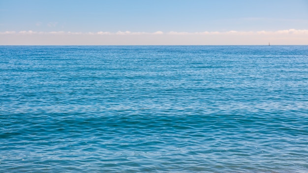 Beautiful summer seascape with blue ocean background