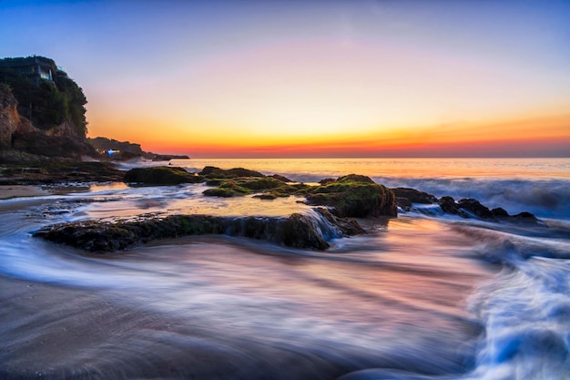 beautiful  sunrise  on  beach  in  bali island