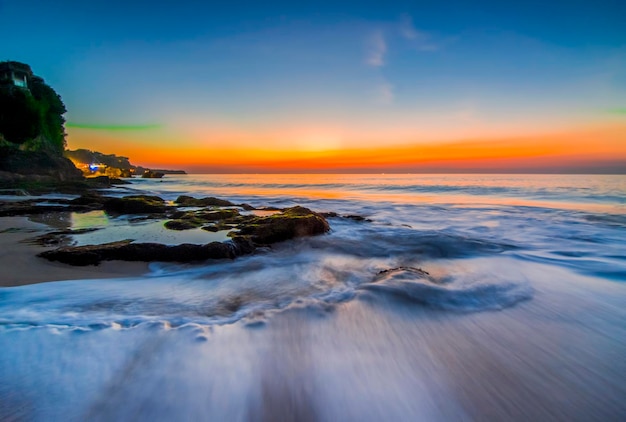 beautiful  sunrise  on  beach  in  bali island