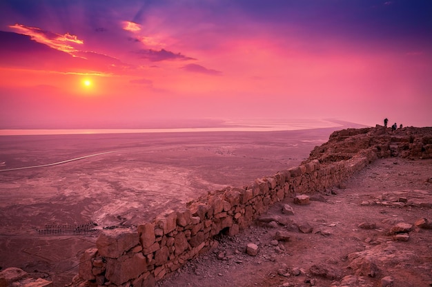 Beautiful sunrise over Masada fortress Ruins of King Herod's palace in Judaean Desert