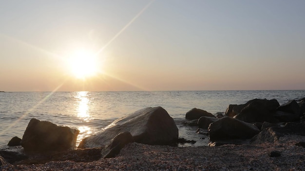 A beautiful sunrise over the sea foreground stone backgrounds