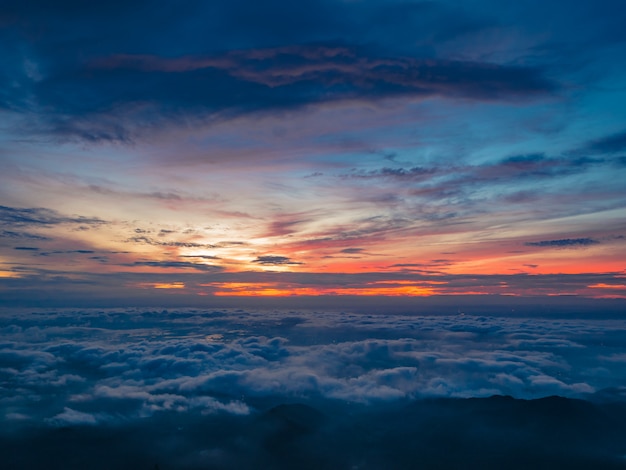 Beautiful Sunrise Sky with Sea of the mist of fog in the morning on Khao Luang mountain in Ramkhamhaeng National Park,Sukhothai province Thailand