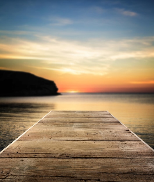 Beautiful  sunset on the beach on background.