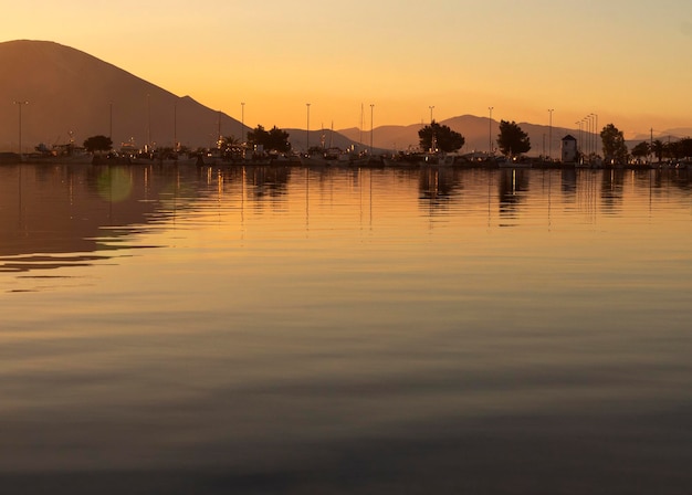 Beautiful sunset on the calm Aegean Sea on the island of Evia Greece