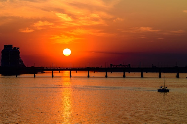 Beautiful sunset over the river Dnieper Dnipro Ukraine