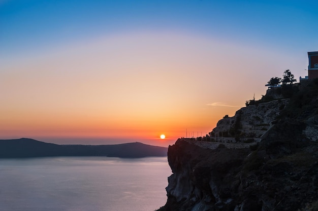 Beautiful sunset on Santorini island, Greece. Summer landscape with sea view