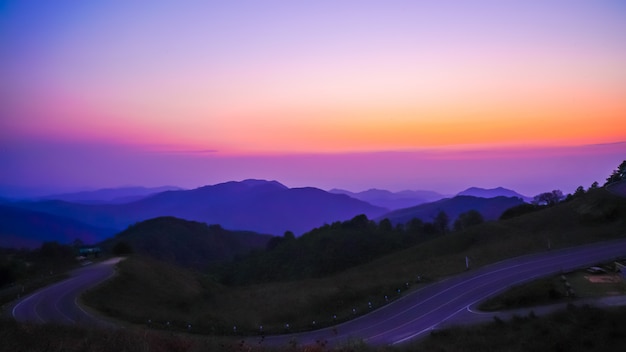 Beautiful sunset sky with mountain and road