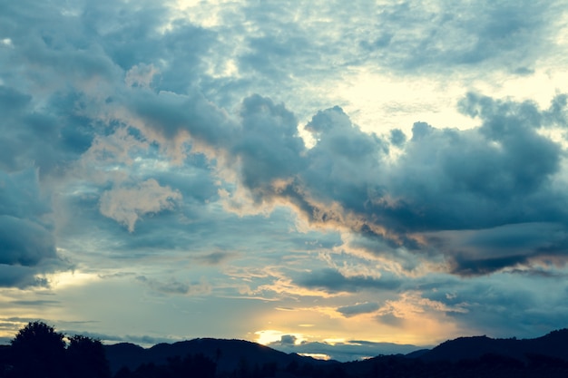 Beautiful sunset twilight time behind the mountain