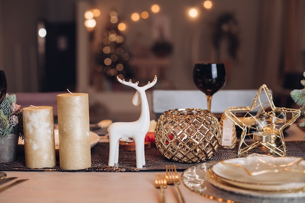 Beautiful table is setting for Christmas dinner