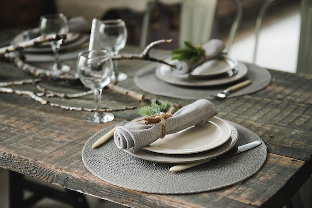 Beautiful table setting for Christmas dinner, decorations for the New Year's table. 