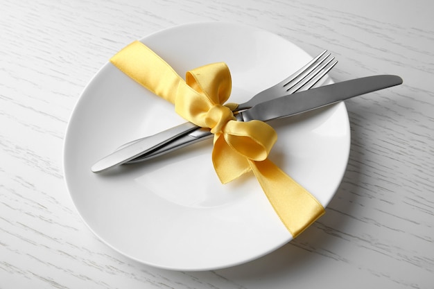 Beautiful table setting on white wooden table