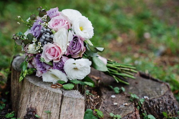 Beautiful tender wedding bouquet and rings