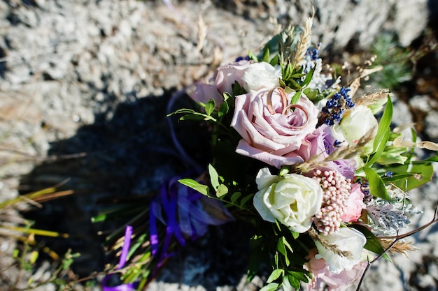 Beautiful tender wedding bouquet and rings