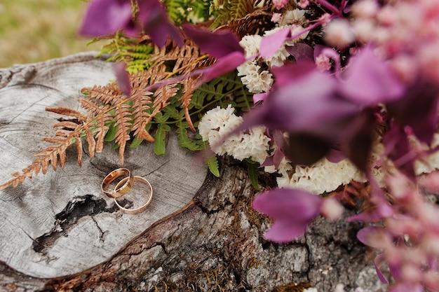 Beautiful tender wedding bouquet and rings