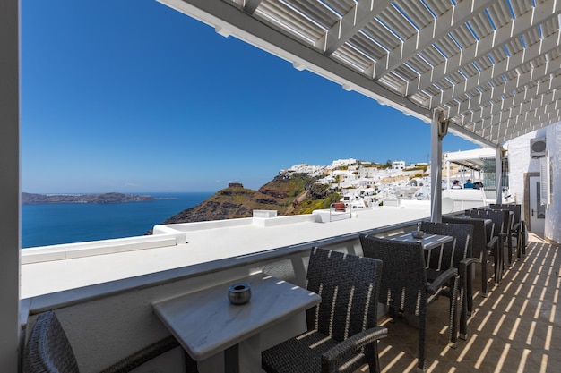 Beautiful terrace and caldera view. Amazing luxury vacation landcsape panorama, Santorini, Greece