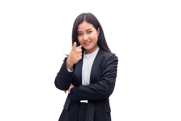 Beautiful Thai Asian woman in a suit is pointing her finger and looking at the camera. with white background