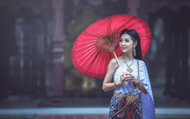 Beautiful Thai woman in Traditional Thai dress