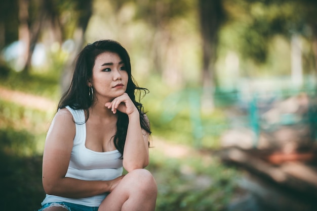 Beautiful thai woman very sad from unrequited loveShe rethink and think over about lovevintage styledark tonebroken heartasian girl think a lot because she fat