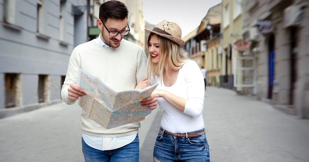 Beautiful tourist couple in love traveling and sightseeing