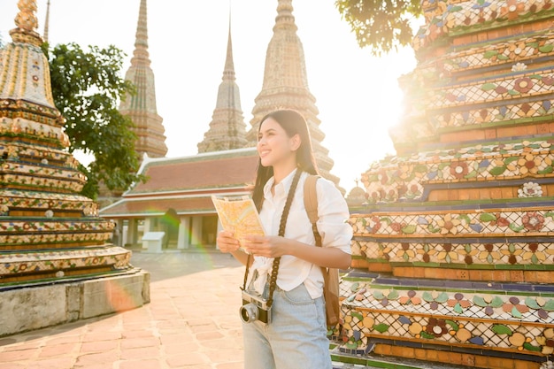 Beautiful tourist woman on vacation sightseeing and exploring Bangkok