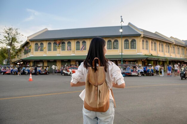 Beautiful tourist woman on vacation sightseeing and exploring Bangkok