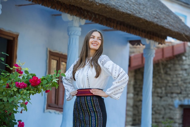 Beautiful traditional costume from Moldova Young girl wearing Romanian traditional blouse