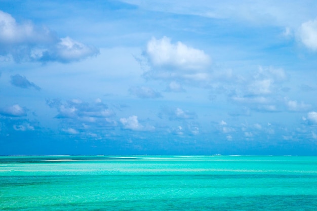 Beautiful tropical Maldives island with beach Sea with water bungalows