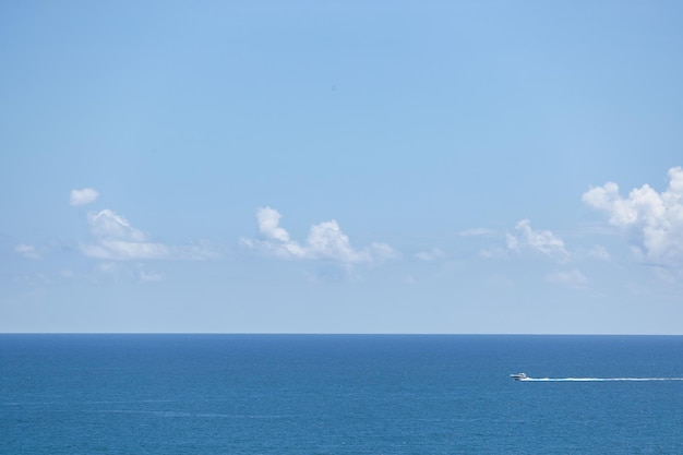 Beautiful view on Atlantic ocean and Small boat