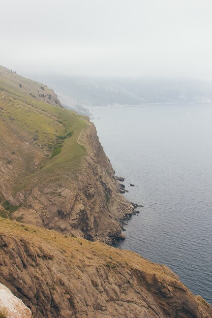 Beautiful view on a Black sea coast with mountains and blue sky.