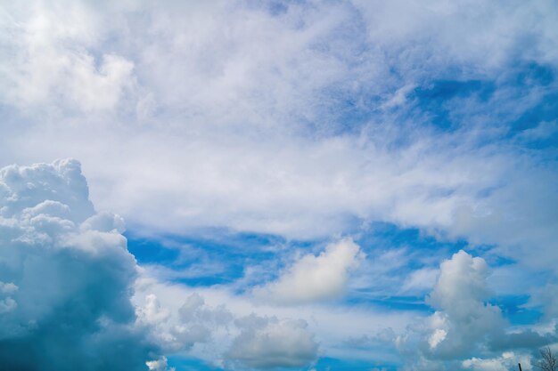 Beautiful view of blue sky with clouds at sunrise Partly cloudyBackground cloud summer Cloud summer Sky cloud clear with sunset Natural sky cinematic beautiful yellow and white texture background