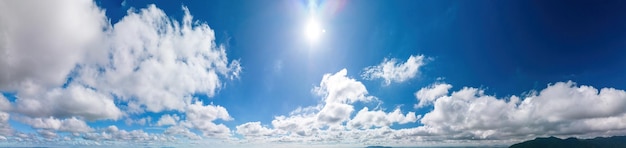 Beautiful view of blue sky with clouds at sunrise Partly cloudyBackground cloud summer Cloud summer Sky cloud clear with sunset Natural sky cinematic beautiful yellow and white texture background