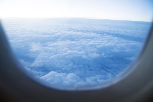 Beautiful view from the airplane window to the air clouds