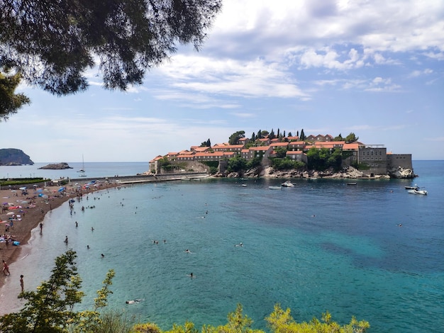 Beautiful view from the rocky beach on Sveti Stefan island in Montenegro