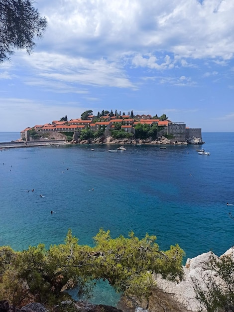 Beautiful view from the rocky beach on Sveti Stefan island in Montenegro