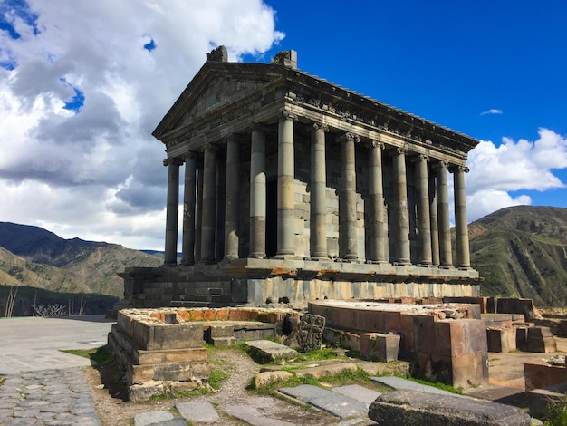 Beautiful view on Garni temple and green mountains in spring Armenia