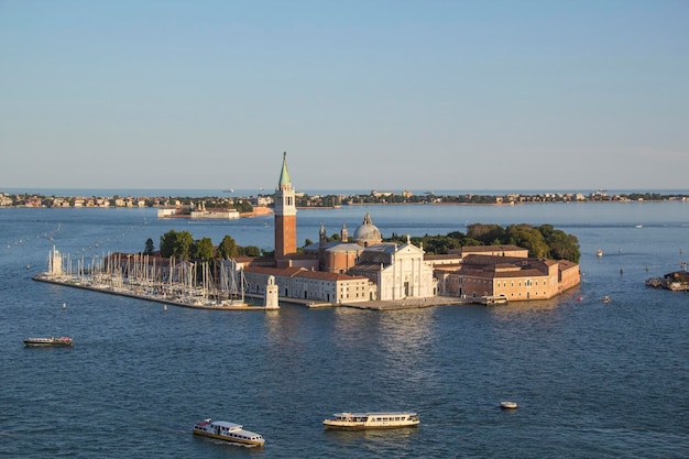 Beautiful view of the gondolas and the Cathedral of San Giorgio Maggiore, on an island in the Veneti