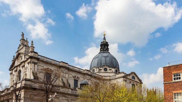 Beautiful view of London Oratory in Knightsbridge, the UK with a cloudy sky background