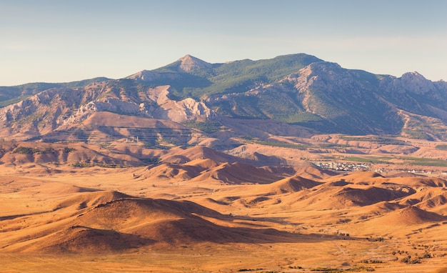 Beautiful view at the mountain valley at sunset in summer