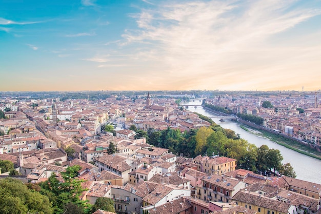 Beautiful view of the panorama of Verona and the Lamberti tower on the banks of the Adige River in V