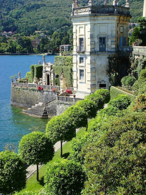 Beautiful view of the park and lake on the sunny day Stresa Italy