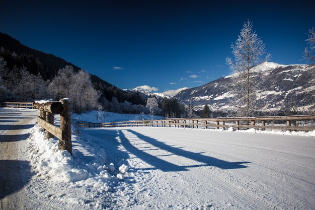 Beautiful view on road covered by snow at high Austrian Alps