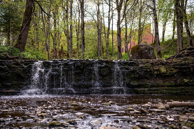 Beautiful view in spring of a waterfall on small river Ivande in Renda Latvia