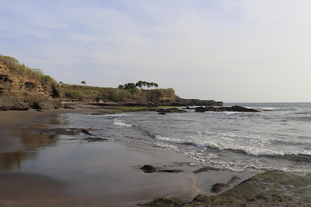 A beautiful view of Tanah Lot temple located in Bali Indonesia