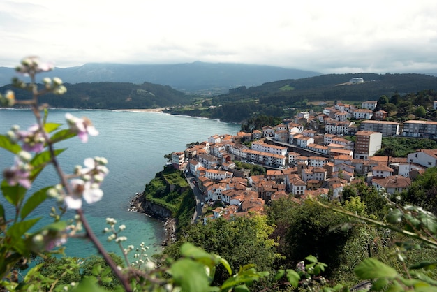 beautiful view of the town of Lastres Asturias with the Cantabrian coast and the mountains in the background