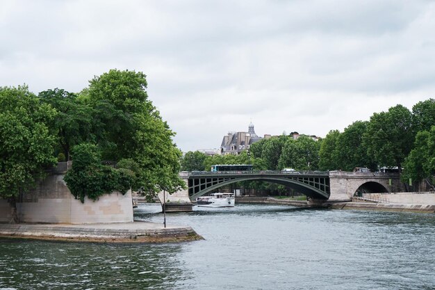 Beautiful view of vintage bridge and river in city