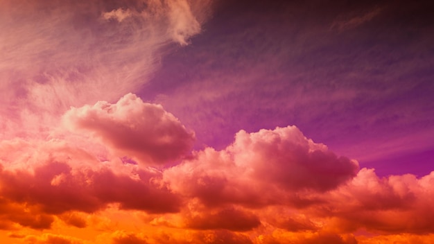 Beautiful vivid Coral purple orange Sky wallpaper at Sunset with clouds darmatic Sunshine sky Beautiful View evening clouds fast moving away