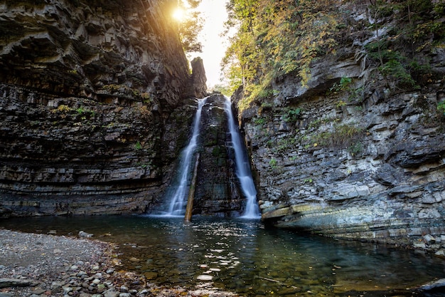 Beautiful waterfall among the canyon in the Carpathian mountains