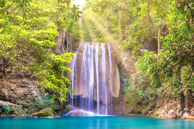 Beautiful waterfall and emerald lake in green tropical jungle forest Nature landscape of Erawan National park Kanchanaburi Thailand