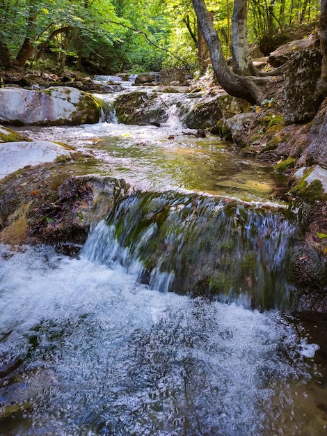 Beautiful waterfall in the mountain gorge