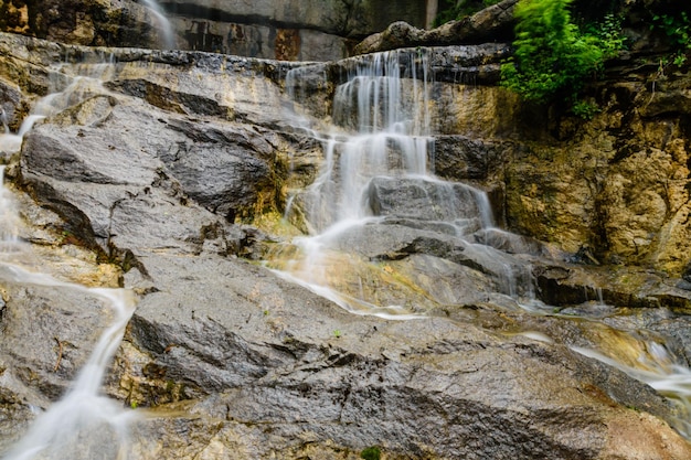 Beautiful waterfall on small river in a park